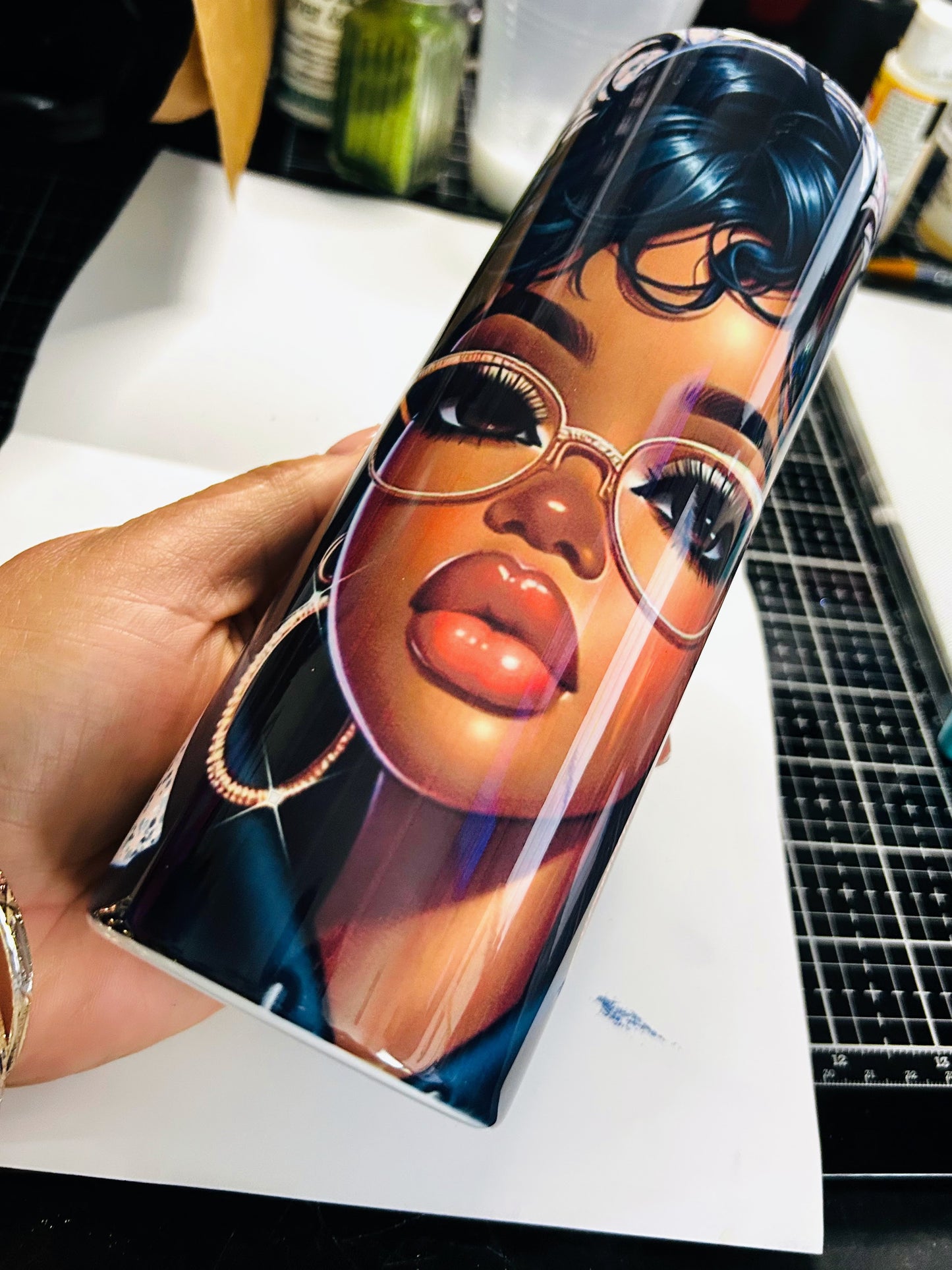 “Glam queen tumbler with rhinestone glasses and hoop earrings on illustrated Black woman – luxury Afrocentric drinkware”