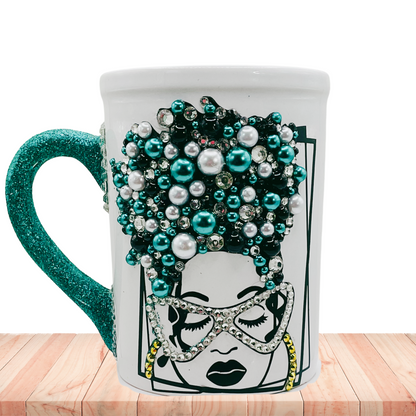 Handmade glam coffee mug featuring a Black woman with rhinestone afro, pearl embellishments, and velvet handle — perfect gift for confident, stylish women.